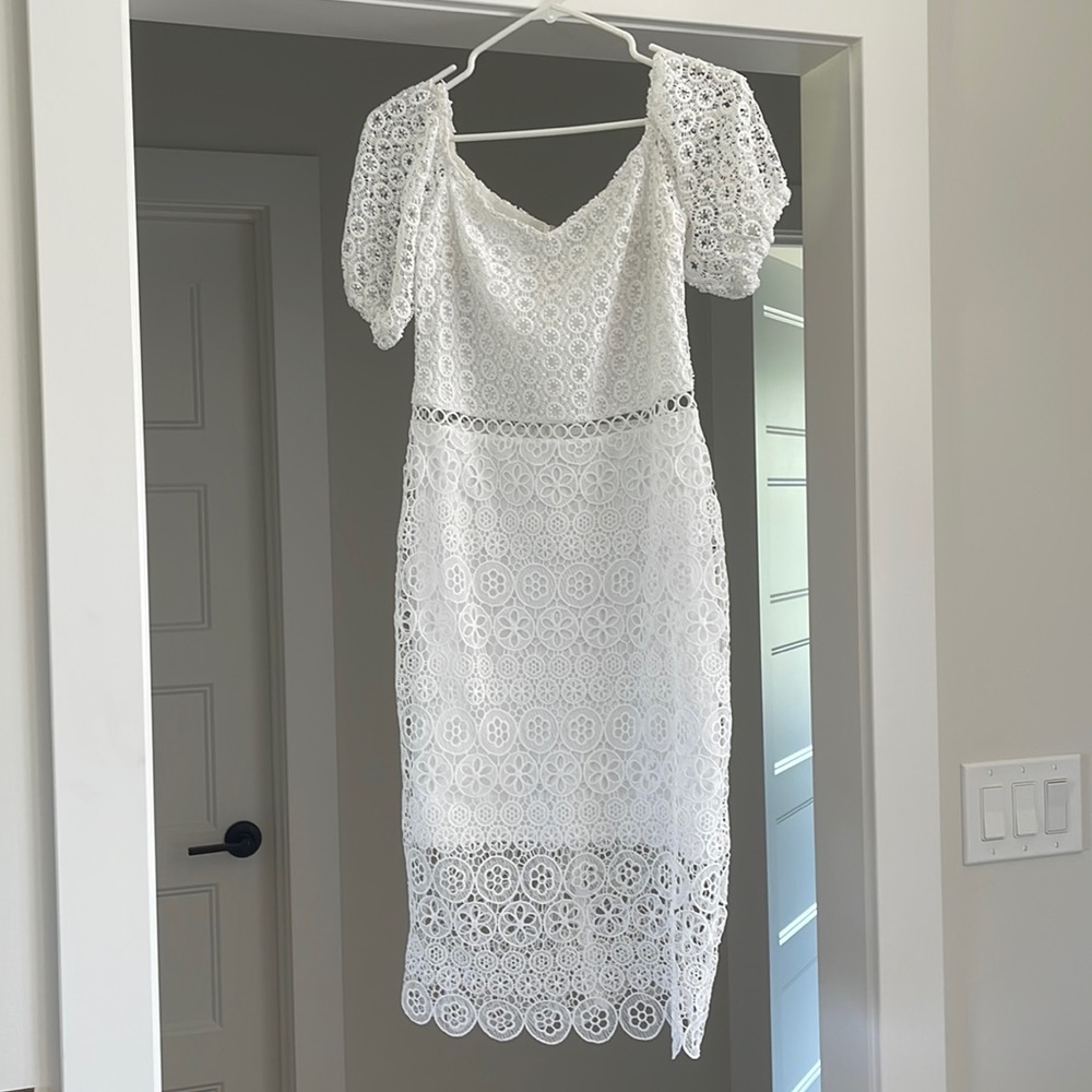 White form fitting dress with puffy sleeves | rehearsal dinner, bridal shower
